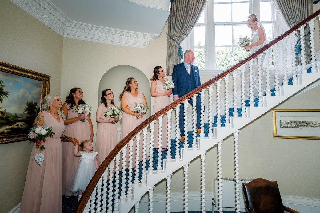 bridesmaids and bride at sedgebrook hall wedding venue