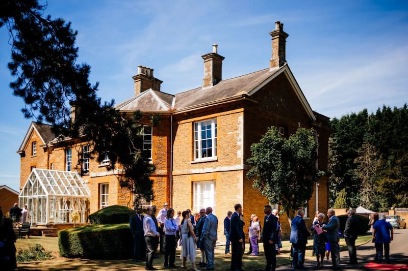 Wedding party outside of Sedgebrook Hall wedding venue